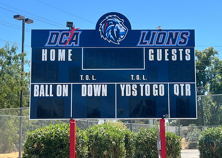 Custom sports scoreboard for Destiny Christian Academy Lions created and installed by Sign Masters, Sacramento area athletic signage experts.